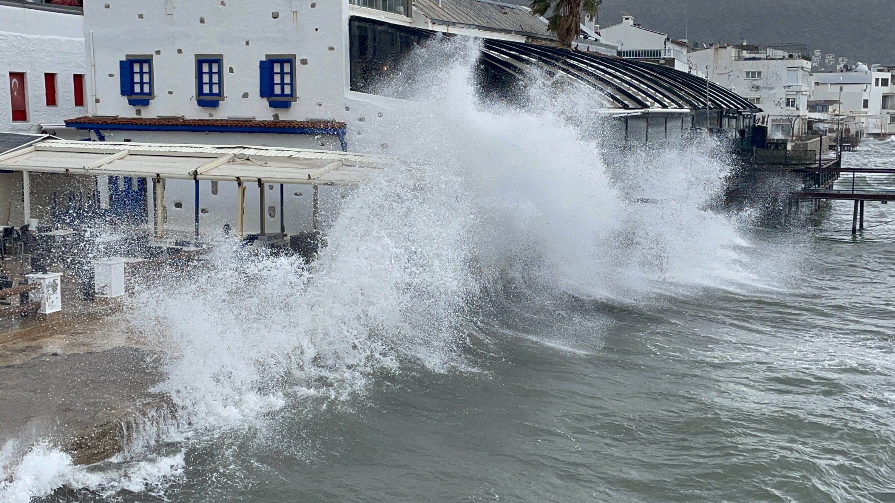 Roaring waves batter the buildings on the coast in Bodrum district, in Muğla, southwestern Turkey, Dec. 7, 2021. (AA PHOTO) 