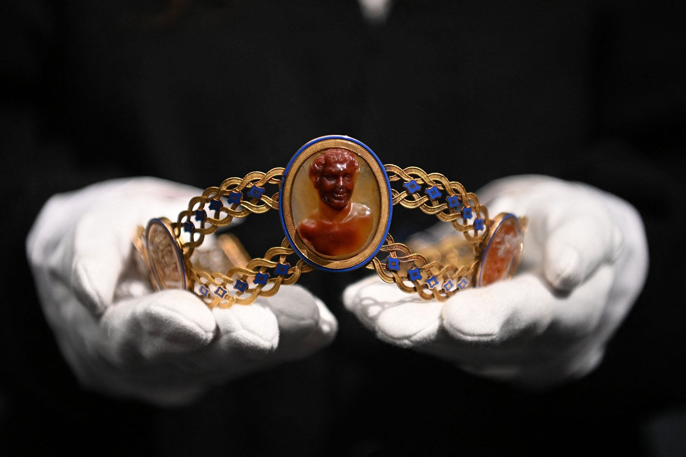 A gold, cameo and enamel diadem by Jacques-Amboise Oliveras, circa 1808, believed to have belonged to Empress Josephine Bonaparte of France, is displayed during a photocall at Sotheby's Auction House in London, U.K., Dec. 3, 2021. (AFP Photo)