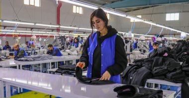 Workers are seen at a textile factory in the eastern province of Van, Turkey, Nov. 25, 2021. (AA Photo)