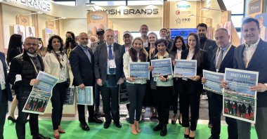 Executives of Turkish retail companies and Turkuvaz Media Group at the Turkish Brands booth during the MAPIC fair, Cannes, France, Nov. 30, 2021.