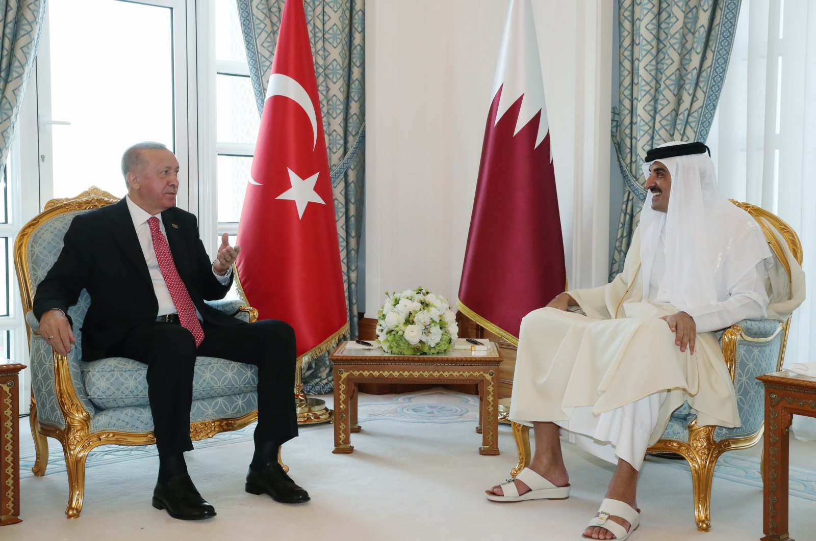 President Recep Tayyip Erdoğan (L) and the emir of Qatar, Sheikh Tamim bin Hamad Al Thani, during their meeting at the Amiri Diwan Palace in Doha, Qatar, Dec. 7, 2021. (EPA Photo)