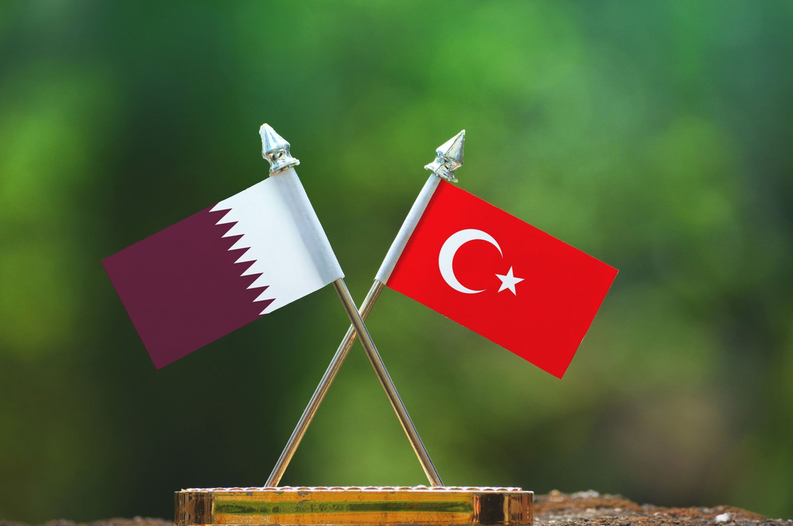 The flags of Qatar and Turkey. (Photo by Shutterstock)