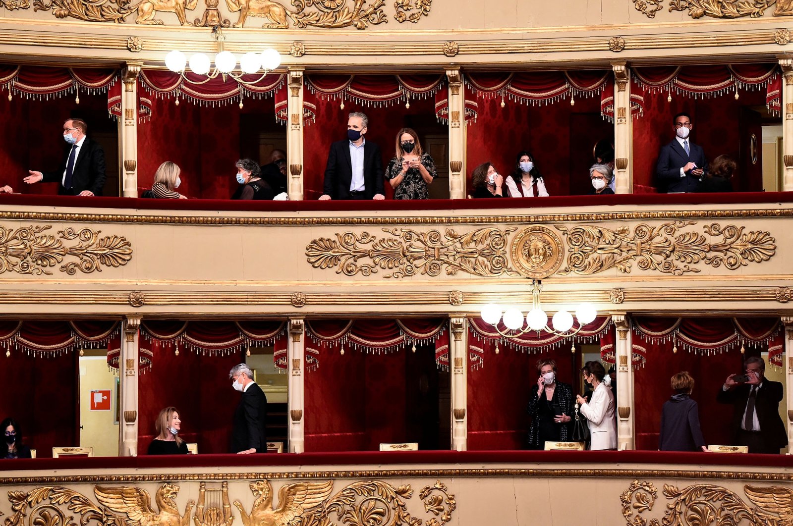 People attend the re-opening of La Scala opera house after it was closed due to the COVID-19 pandemic, in Milan, Italy, May 10, 2021. (Reuters Photo)