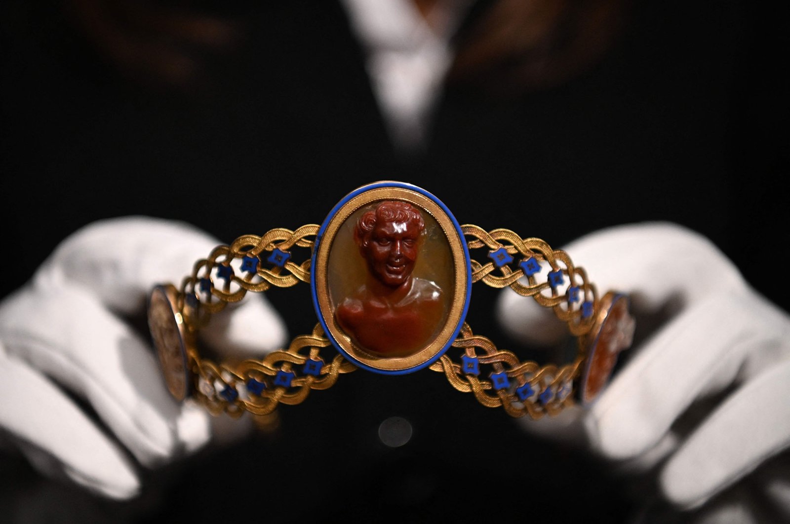 A gold, cameo and enamel diadem by Jacques-Amboise Oliveras, circa 1808, believed to have belonged to Empress Josephine Bonaparte of France, is displayed during a photocall at Sotheby&#039;s Auction House in London, U.K., Dec. 3, 2021. (AFP Photo)
