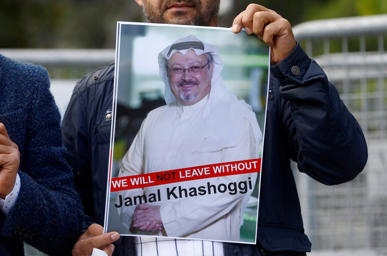 A demonstrator holds a picture of Saudi journalist Jamal Khashoggi during a protest in front of Saudi Arabia&#039;s consulate in Istanbul, Turkey, Oct. 5, 2018. (Reuters Photo)
