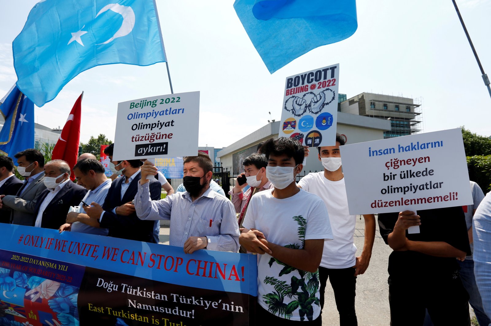 Ethnic Uyghur demonstrators take part in a "No Beijing 2022" protest calling for a boycott of Beijing 2022 Winter Olympic Games, in front of the Olympic House, the headquarters of Turkey&#039;s National Olympic Committee (TMOK), in Istanbul, Turkey June 23, 2021. (Reuters Photo)
