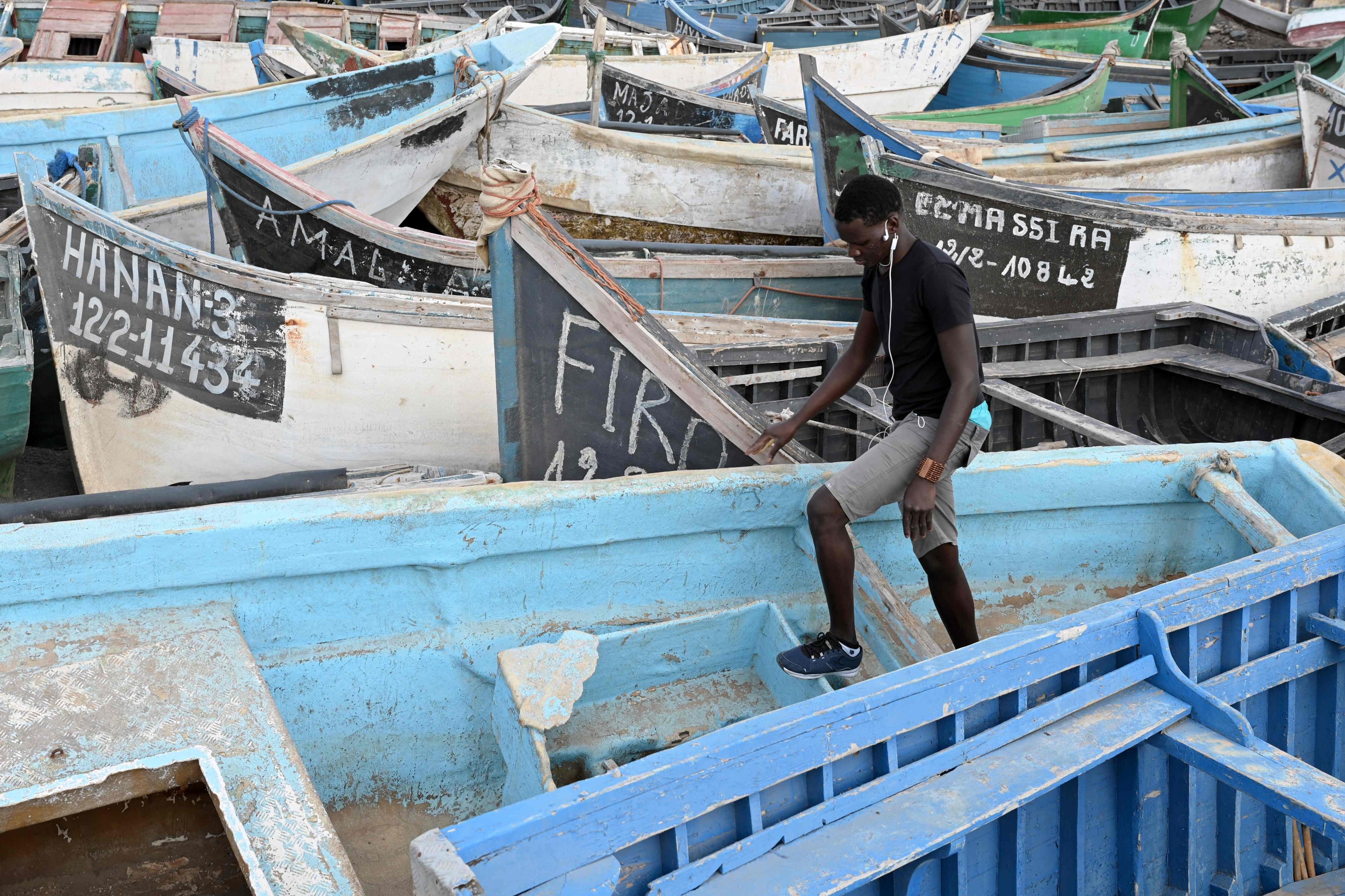 Malian migrant 'Mamadou,' 21, who arrived in a boat in August 2020, is pictured in a 'boat cemetery' in Arinaga on the island of Gran Canaria, Spain, Nov. 18, 2021. (AFP Photo)