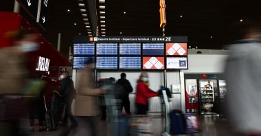 Passengers walk in the departures area of the Terminal 2 at Paris Charles de Gaulle airport in Roissy-en-France near Paris, France, Dec. 2, 2021. (Reuters File Photo)