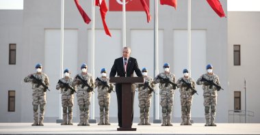 President Recep Tayyip Erdoğan speaks to Turkish soldiers at the joint Turkey-Qatar base in Doha, Qatar, Dec. 7, 2021. (AA Photo)