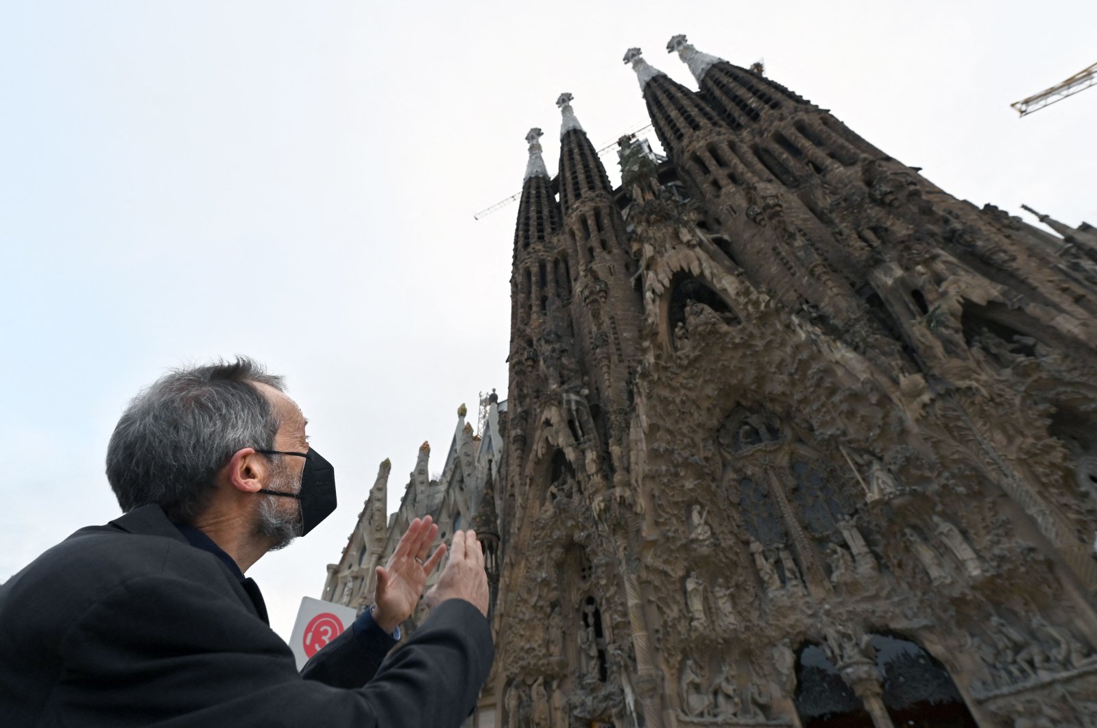 The architect director of the works of the Sagrada Familia basilica, Jordi Fauli, poses outside the catholic temple during an interview with AFP in Barcelona on Dec. 1, 2021. (AFP Photo)