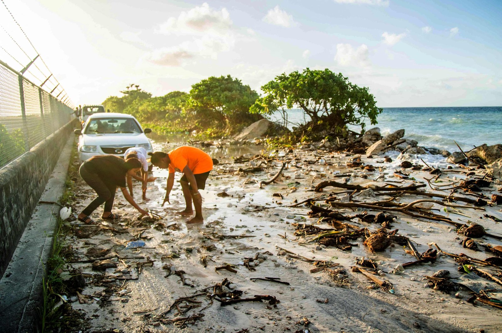 Kepulauan Pasifik kebanjiran, perubahan iklim, naiknya permukaan laut di tempat kerja