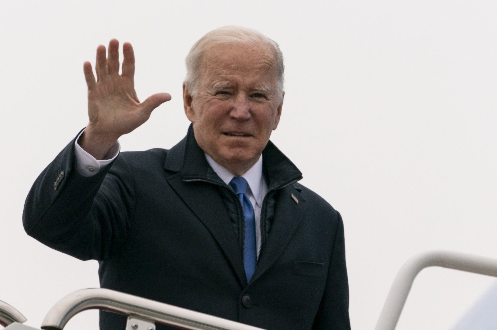 U.S. President Joe Biden waves as he boards Air Force One upon departure at Andrews Air Force Base, Maryland, U.S., Dec. 8, 2021. (EPA Photo)