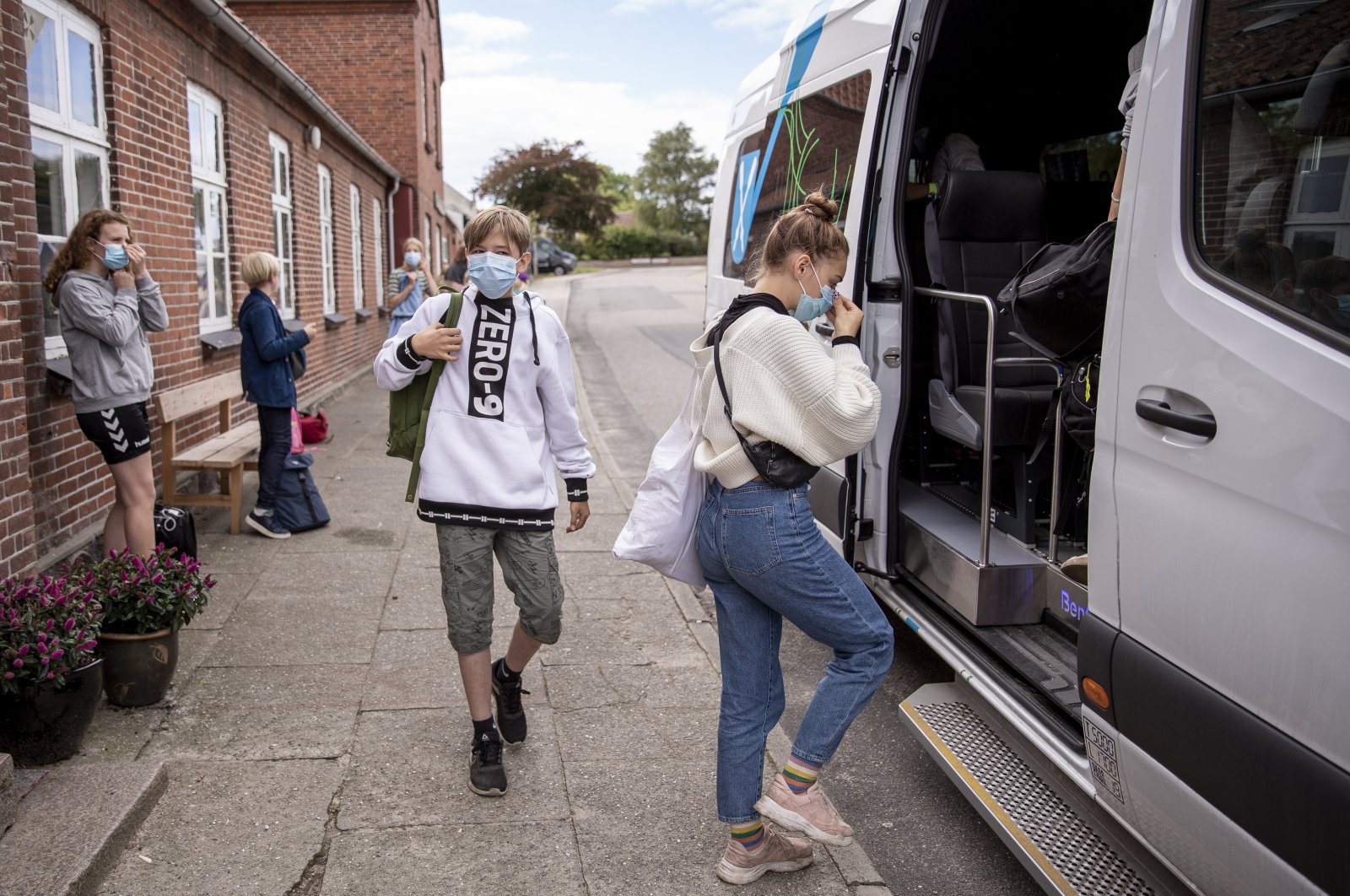 Students board the school bus at a schol in Samso, Denmark, Sept. 7, 2020. (Getty Images)