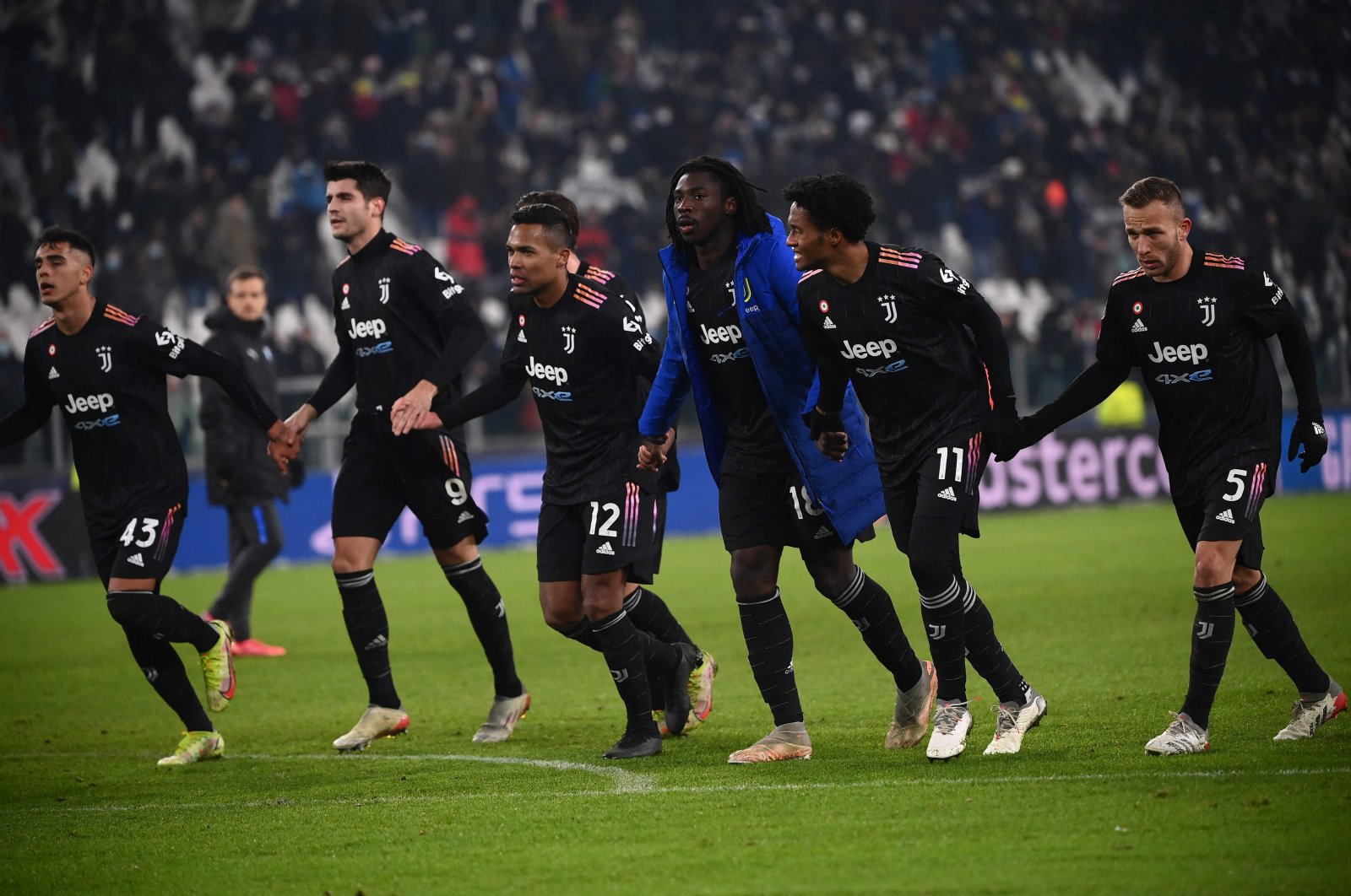 Juventus players celebrate after the Champions League Group H match against Malmo, in Turin, Italy, Dec. 8, 2021. (AFP Photo)