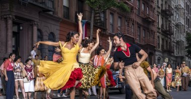 Ariana DeBose as Anita (foreground L) and David Alvarez as Bernardo in &quot;West Side Story.&quot; (20th Century Studios handout via AP)