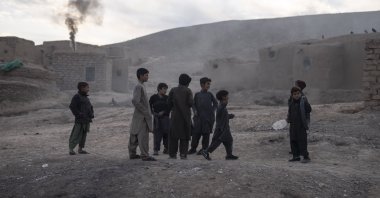 Children play in Kamar Kalagh village near Herat, Afghanistan, Nov. 27, 2021. (AP Photo)