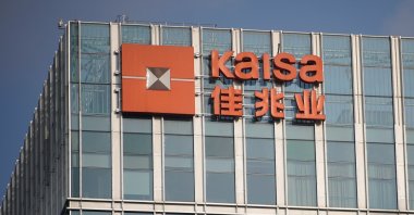 A sign of the Kaisa Holdings Group is seen at the Shanghai Kaisa Financial Centre, in Shanghai, China, Dec. 7, 2021. (Reuters Photo)