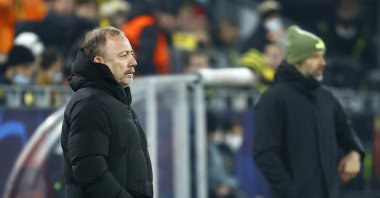 Sergen Yalçın watches the game against Borussia Dortmund, at Signal Iduna Park, in Dortmund, Germany, Dec. 7, 2021. (AA Photo)