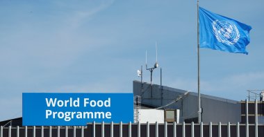A World Food Programme's flag flutters on the roof of WFP's headquaters after the organization won the 2020 Nobel Peace Prize, in Rome, Italy, Oct, 9, 2020. (Reuters Photo)