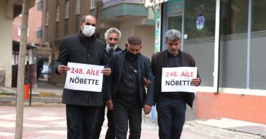 Father Abdurrahman Bozanlı (C) is accompanied by relatives to attend the protest in front of the HDP headquarters in Diyarbakır, Turkey, Dec. 9, 2021. (AA Photo)