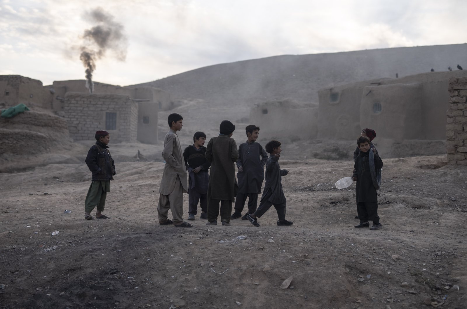 Children play in Kamar Kalagh village near Herat, Afghanistan, Nov. 27, 2021. (AP Photo)