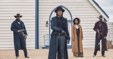 This image released by Netflix shows Regina King (C) from the film &quot;The Harder They Fall.&quot; (AP Photo)