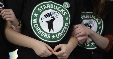 Starbucks employees and supporters react as votes are counted during a union-election watch party, New York, U.S., Dec. 9, 2021.  (AP Photo)