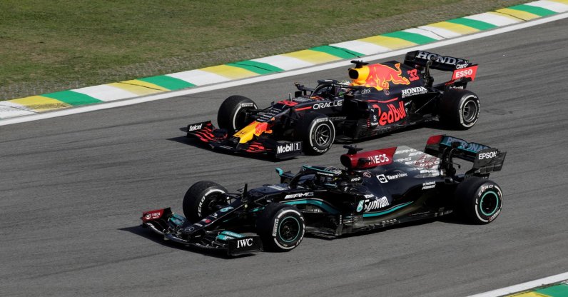 Mercedes' Lewis Hamilton (front) and Red Bull's Max Verstappen compete during the Brazilian Formula 1 GP at the Jose Carlos Pace racetrack in Sao Paulo, Brazil, Nov. 14, 2021. (EPA Photo)