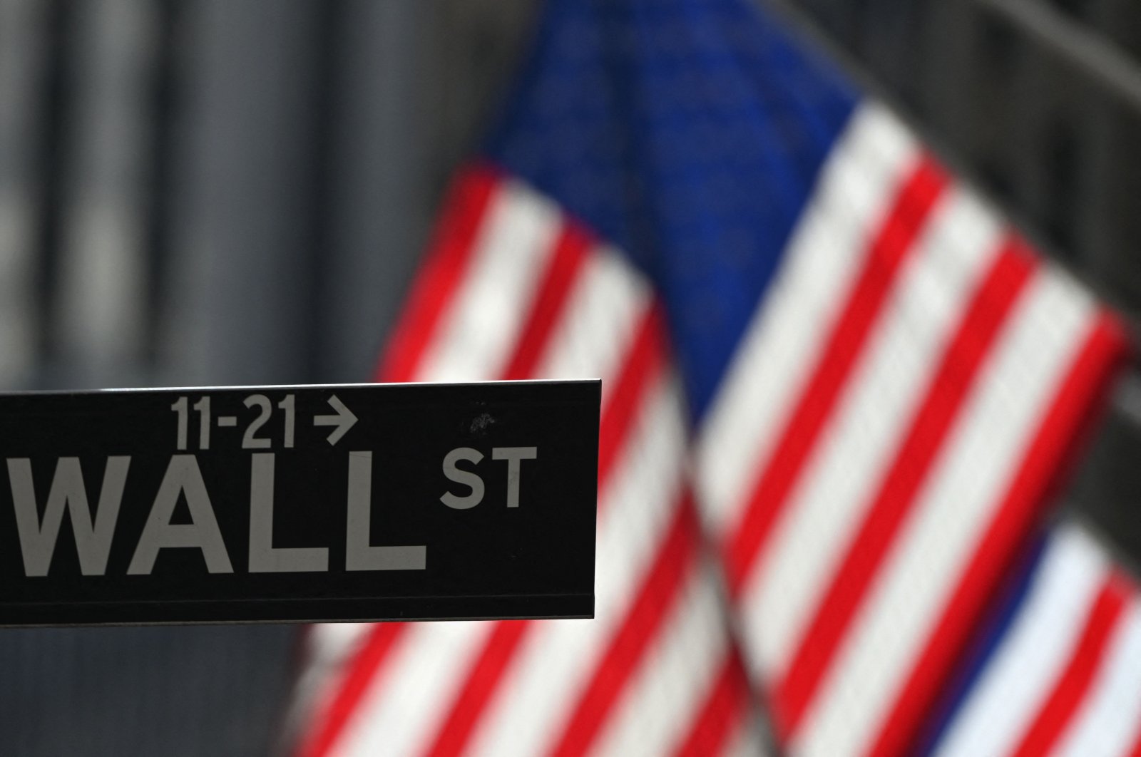 A Wall Street sign at the New York Stock Exchange (NYSE) is seen in New York City, New York, U.S., Feb. 17, 2021. (AFP Photo)