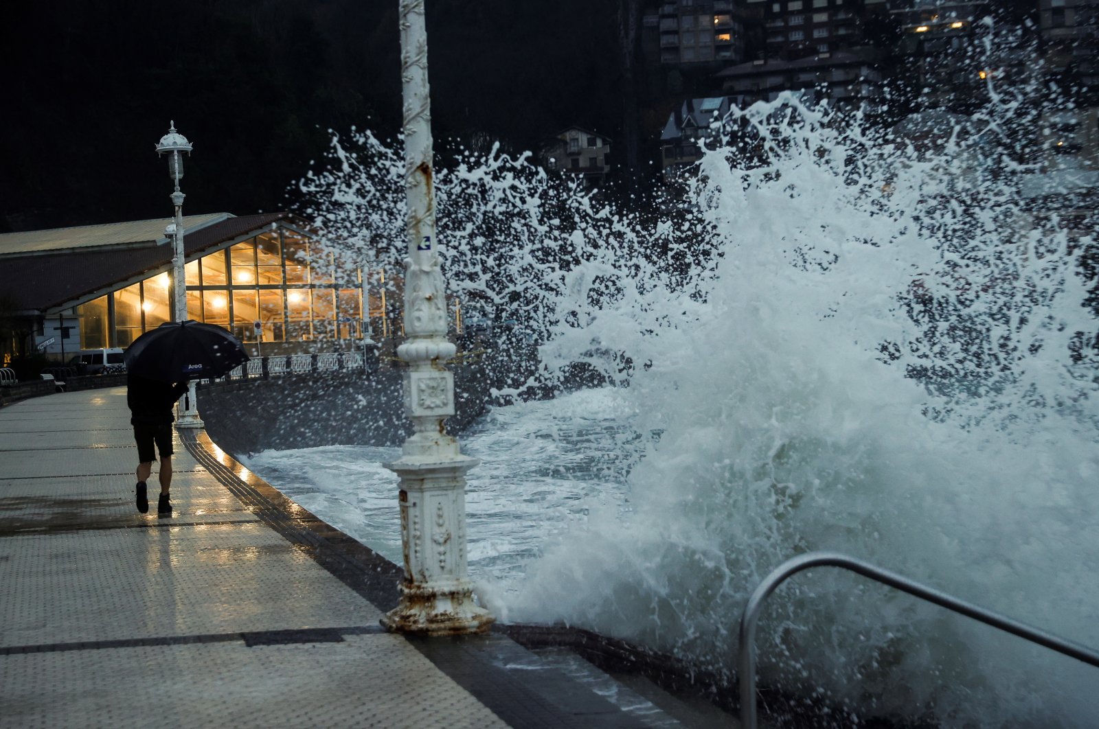 Big waves crash on the promenade in San Sebastian, Spain, Dec. 9, 2021. (EPA Photo)