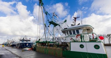 Fishing boats docked in the harbor of Ouistreham, northwestern France, Dec. 10, 2021. (AFP Photo)