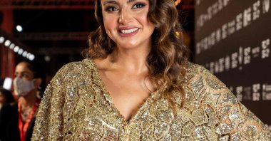 Tunisian actress Amira Derouiche poses on the red carpet during the opening ceremony of the 1st edition of the Red Sea film festival in the Saudi port city of Jeddah, on Dec. 6, 2021. (AFP PHOTO /RED SEA FILM FESTIVAL)