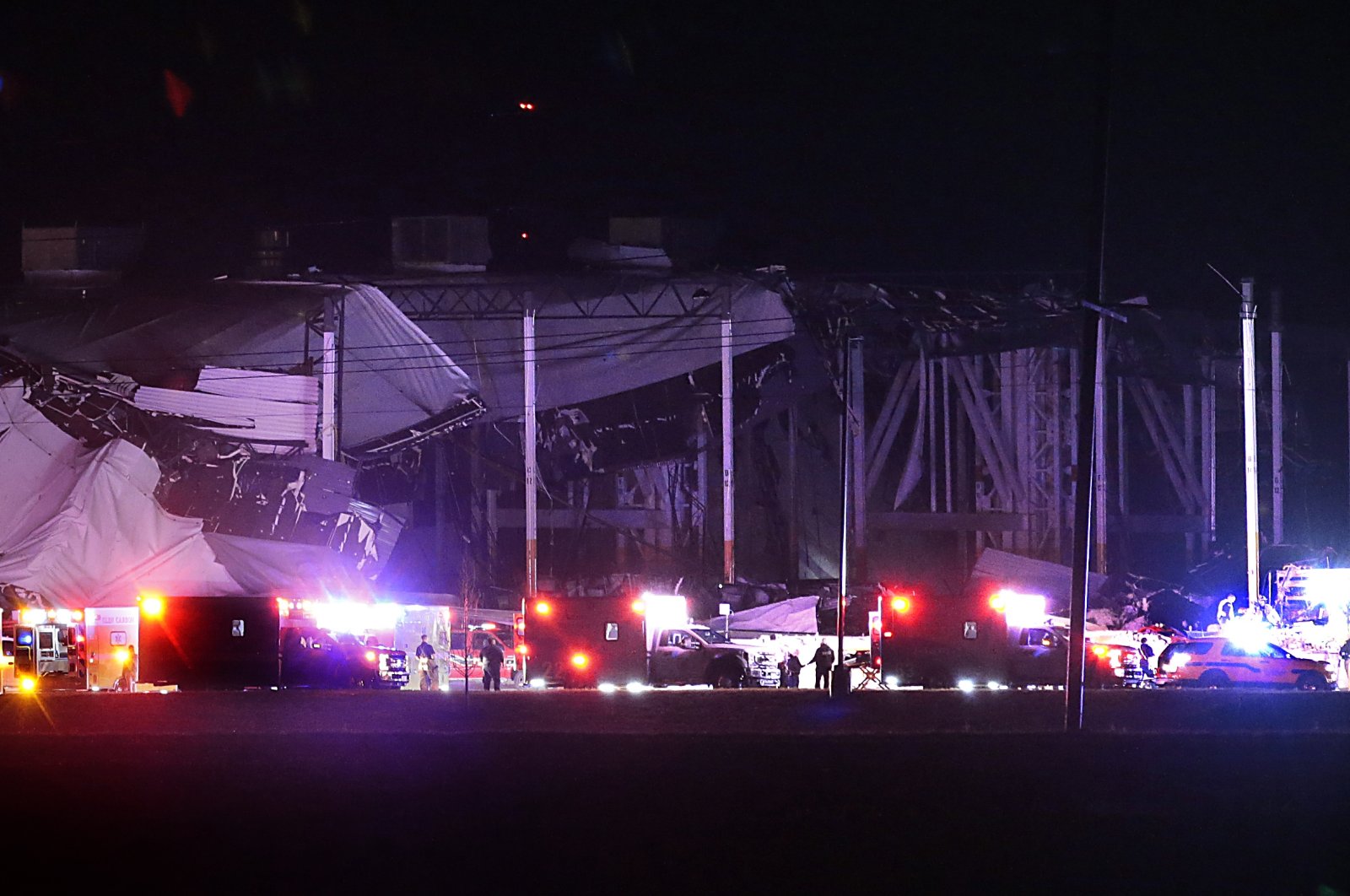 An Amazon distribution center is partially collapsed after being hit by a tornado, Edwardsville, Illinois, U.S., Dec. 10, 2021. (Robert Cohen/St. Louis Post-Dispatch via AP)