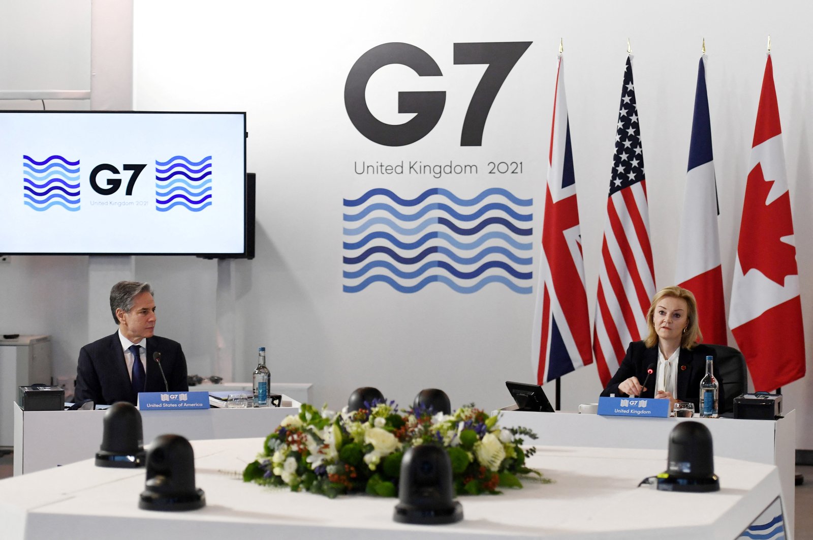 U.S. Secretary of State Antony Blinken listens to British Foreign Secretary Liz Truss as she addresses the opening session of the G-7 summit of foreign and development ministers in Liverpool, U.K., Dec. 11, 2021. (Reuters Photo)