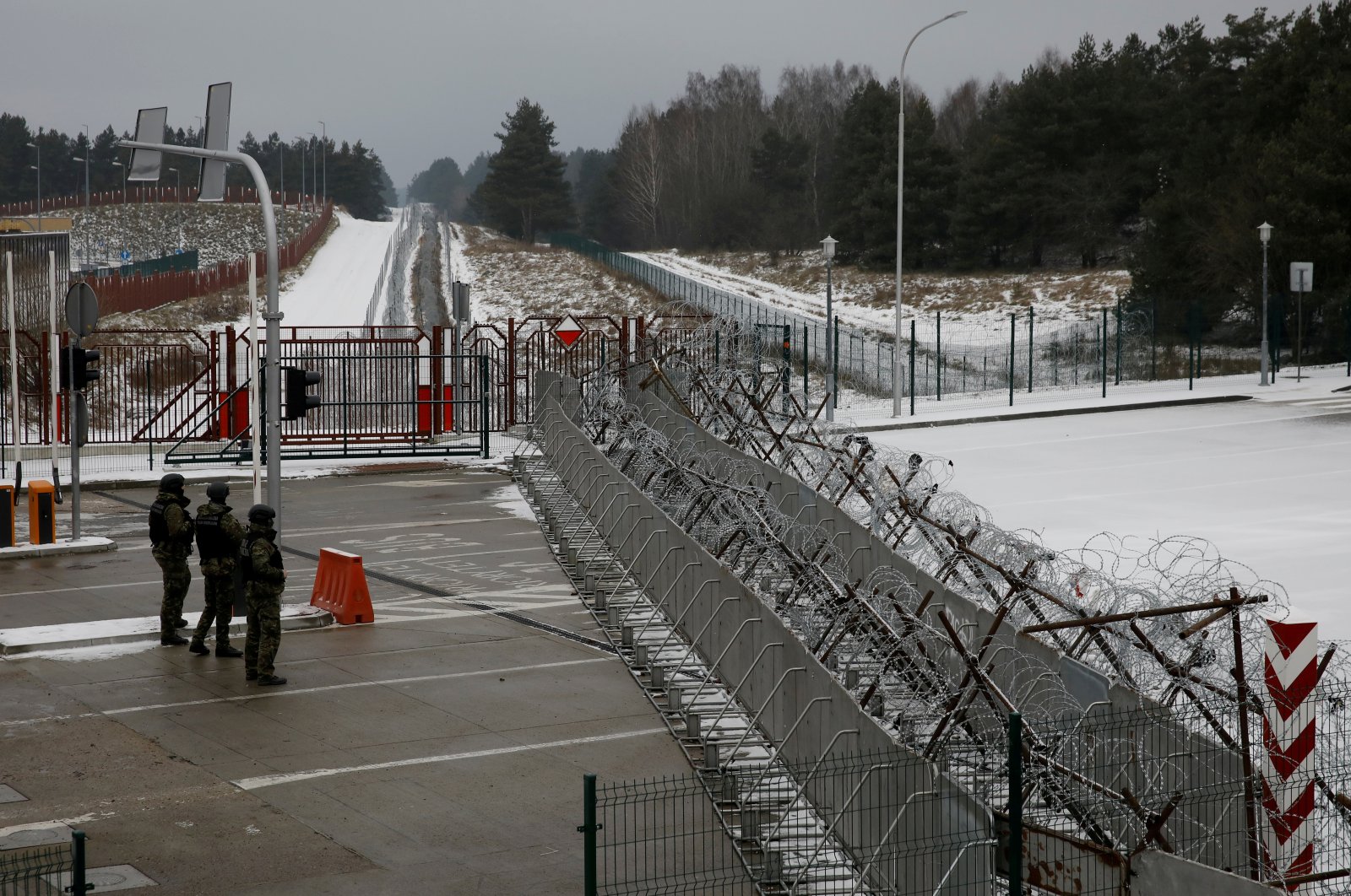 Polish border guards on patrol at the Kuznica-Bruzgi checkpoint on the Polish-Belarusian border amid the migrant crisis, in Kuznica, Poland, Dec. 6, 2021. (Reuters Photo)