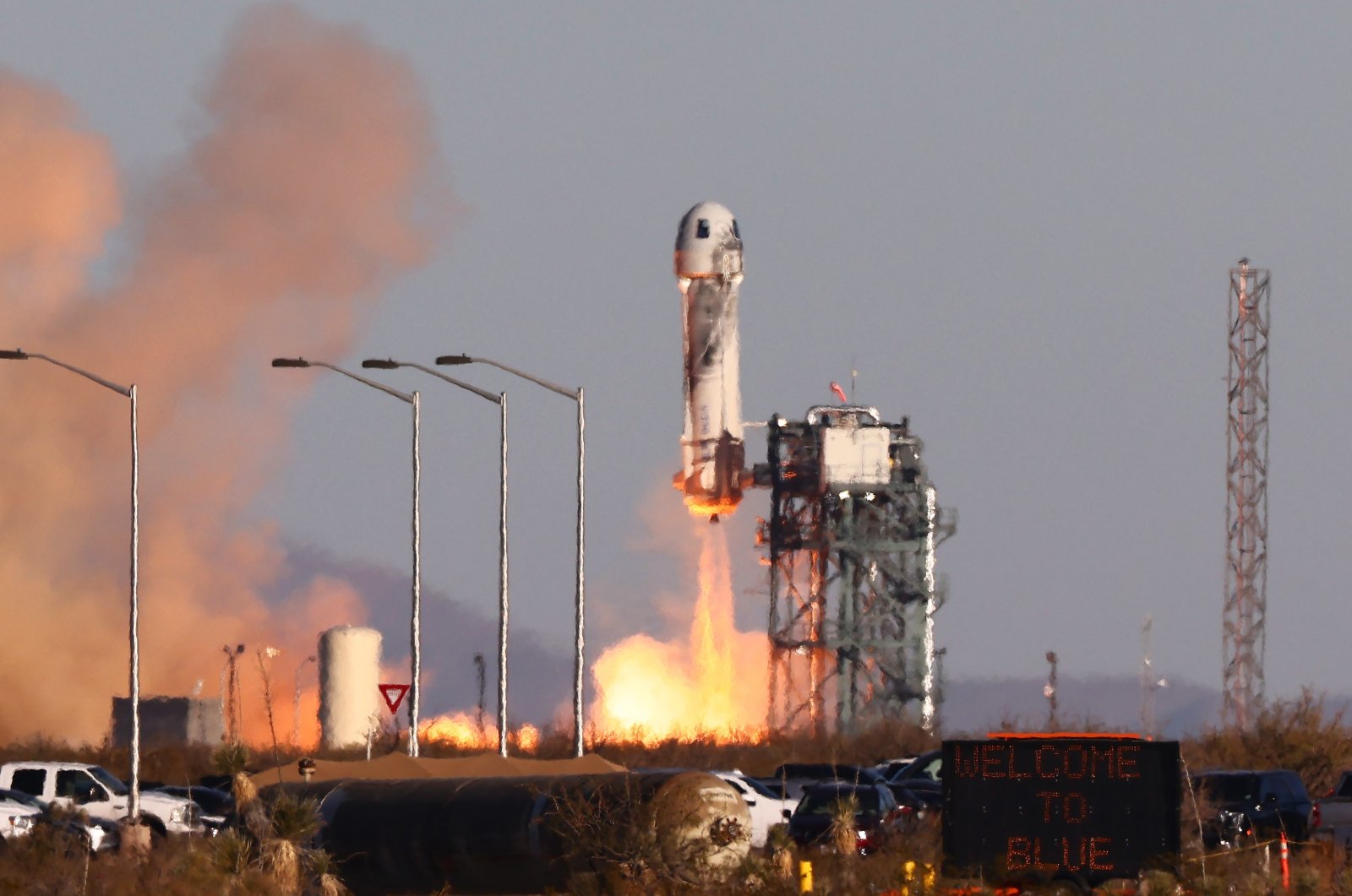 Blue Origin New Shepard lifts off from the Launch Site One launch pad carrying Good Morning America co-anchor Michael Strahan, Laura Shepard Churchley, daughter of astronaut Alan Shepard, and four other civilians, Dec. 11, 2021 near Van Horn, Texas. (AFP Photo)