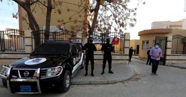 Security personnel stand guard near a polling station during the municipal elections in Tripoli, Libya, Feb. 6, 2021. (REUTERS Photo)