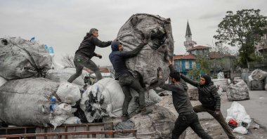 Afghan refugees collect waste at a makeshift dumping ground in Istanbul, Turkey, Nov. 18, 2021. (AFP File Photo)