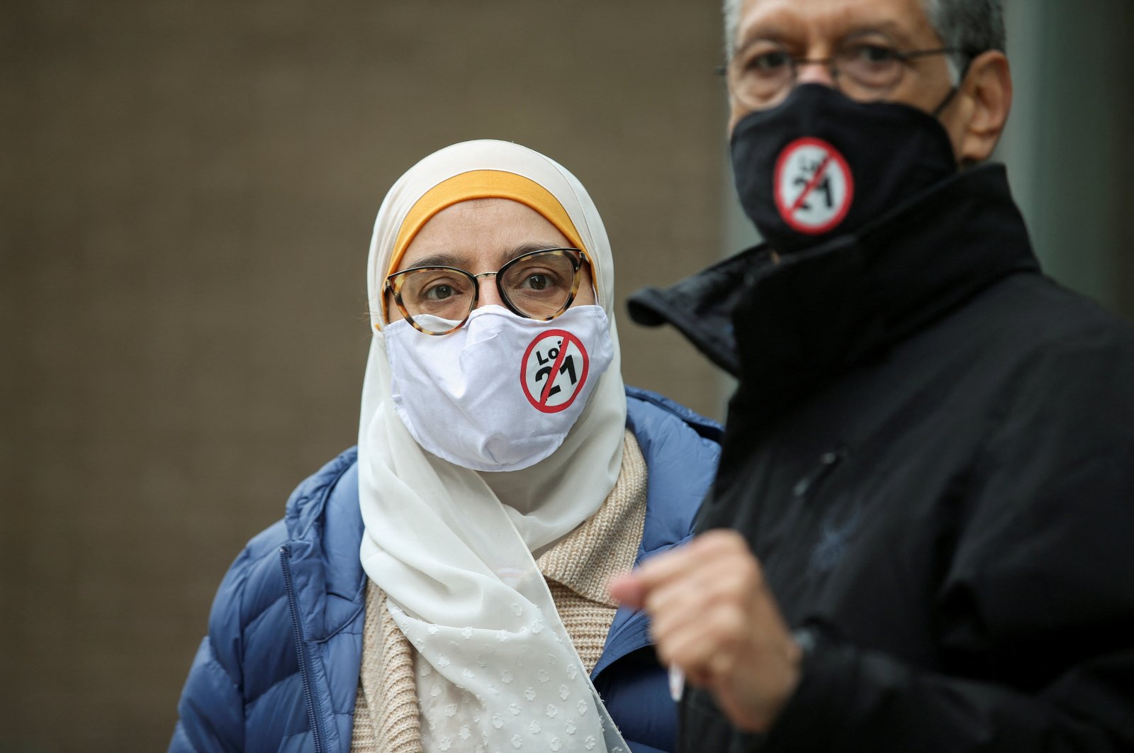 People attend a protest against Bill 21, after a court ruled that some teachers and provincial politicians are exempt from a controversial law that bans public employees from wearing religious symbols, in Montreal, Quebec, Canada, April 20, 2021. (Reuters File Photo)