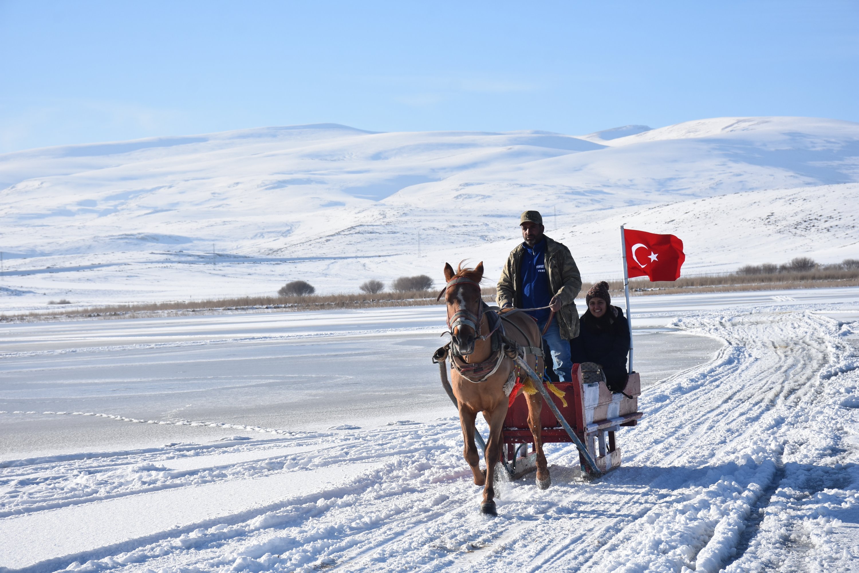 A troika on the frozen surface of Lake Çıldır in the Çıldır district of Ardahan province, eastern Turkey, Dec. 12, 2021. (AA Photo)
