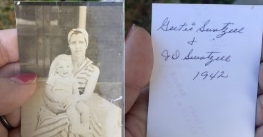 This photo combo shows Katie Posten holding the front and back of a photograph she found stuck to her car's windshield, New Albany, Indiana, U.S., Dec. 11, 2021. (Katie Posten via AP)