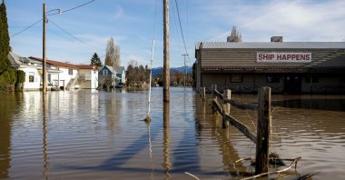 Flood waters surround a shipping business called "Ship Happens" after rainstorms that hit both British Columbia and Washington state caused flooding on both sides of the border, in Sumas, Washington, U.S., Nov. 17, 2021.  (Reuters Photo)