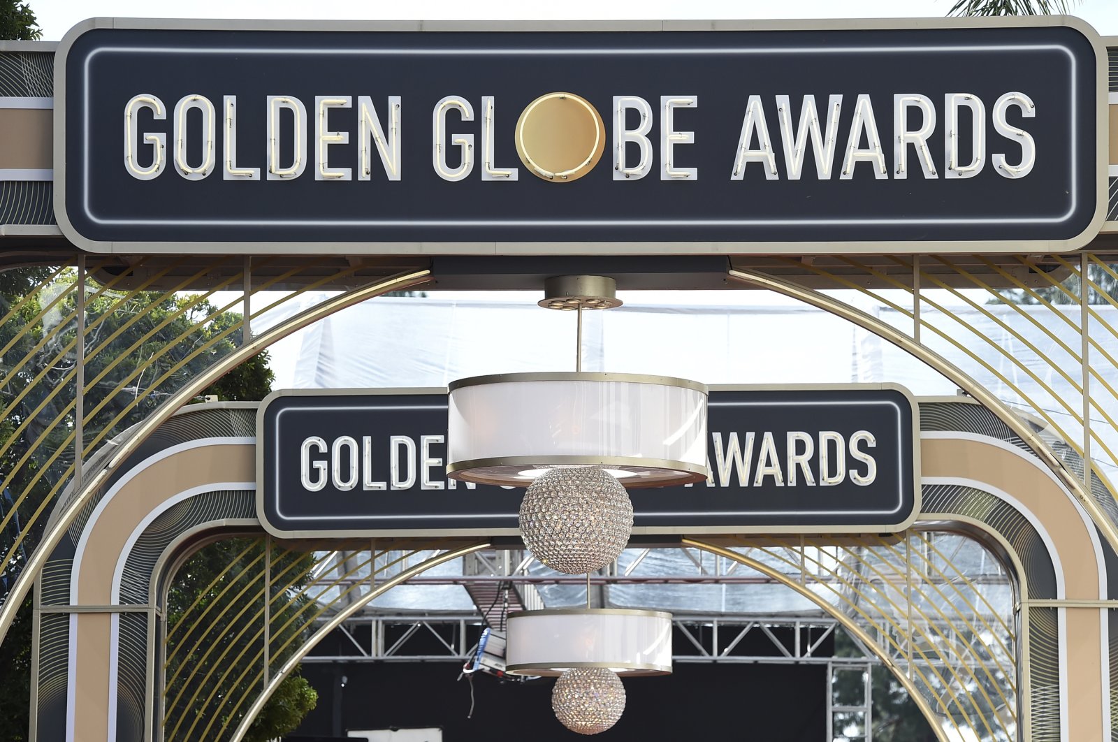 Signs for the 77th annual Golden Globe Awards can be seen above the red carpet in Beverly Hills, California, U.S., Jan. 5, 2020. (AP Photo)
