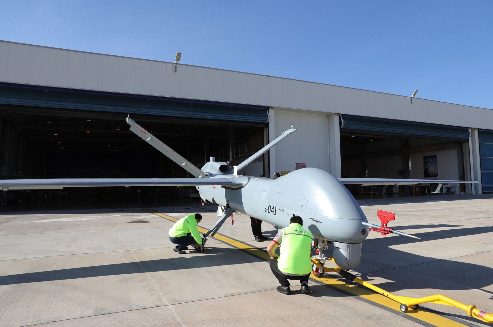 The Anka drone is checked by employees in Ankara, Turkey, March 5, 2021. (AFP Photo)