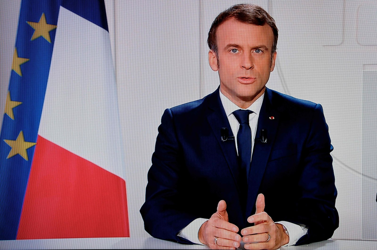 French President Emmanuel Macron addresses the nation from a TV screen at the Elysee palace, after the third independence referendum in New Caledonia, Paris, France, Dec. 12, 2021. (AFP Photo)