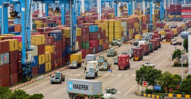 Lines of trucks are seen at a container terminal of Ningbo Zhoushan port in Zhejiang province, China, Aug. 15, 2021. (Reuters Photo)