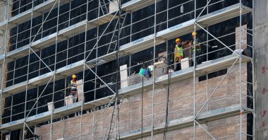 Workers are seen at a construction site in Istanbul, Turkey, May 1, 2020. (Reuters Photo)