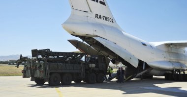A Russian transport aircraft, carrying parts of the S-400 air defense systems, lands at Murted military airport outside Ankara, Turkey, Aug. 27, 2019. (Turkey's Defense Ministry via AP, Pool, File)