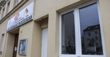 A shattered window of the Ditib Eyüp Sultan Mosque is seen in east Leipzig, Germany, Dec. 14, 2021. (AP Photo)