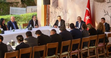 Foreign Minister Mevlüt Çavuşoğlu meets with Turkish businesspeople in the Gulf Emirate of Dubai, UAE, Dec. 14, 2021. (DHA Photo)